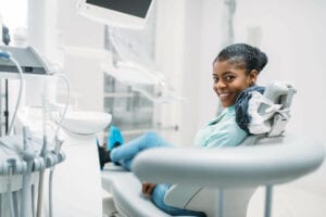 Smiling Female Patient Chair Visit